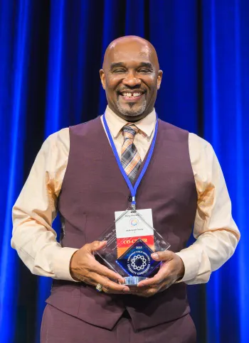 Percy Winters Jr. accepting NWPEDC award
